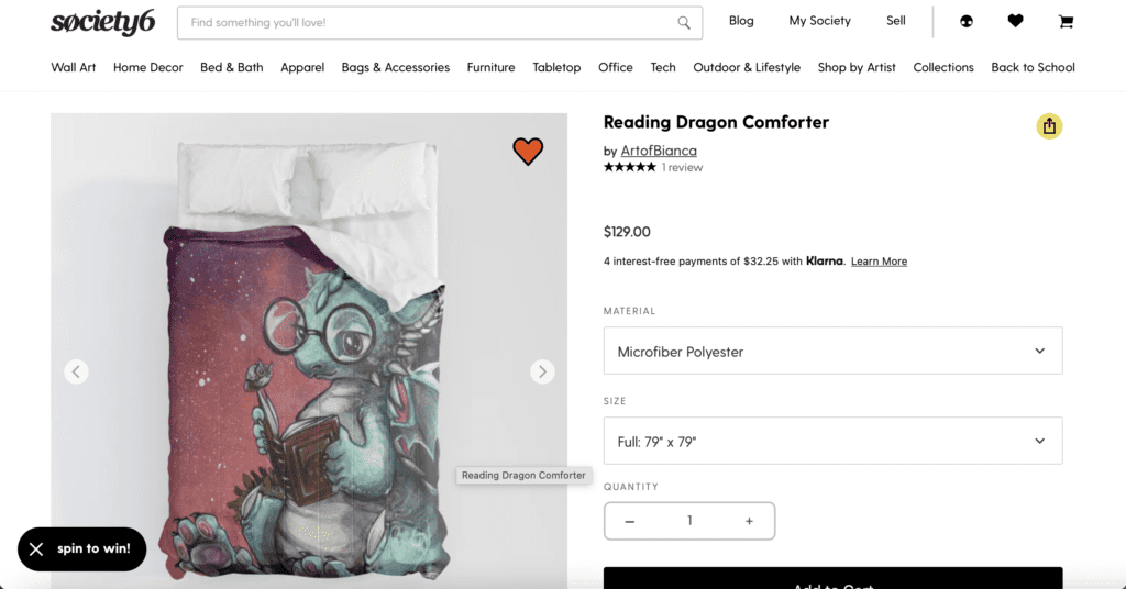 Screenshot of reading dragon comforter from Society6. Dragon gifts for her.