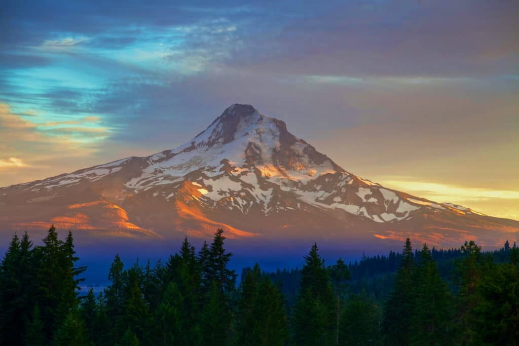 Morning sunshine gilds Mount Hood. Mount Hood is one of the 15 best Portland Oregon day trips for families.