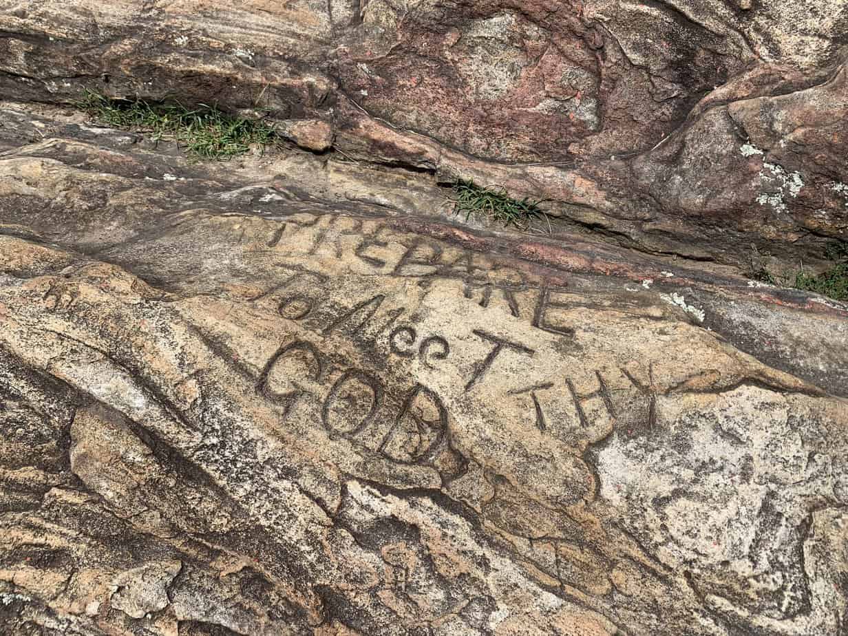 "Prepare to meet thy God" is carved into a boulder that lies at the summit of Kennesaw Mountain at Kennesaw Mountain NBP.