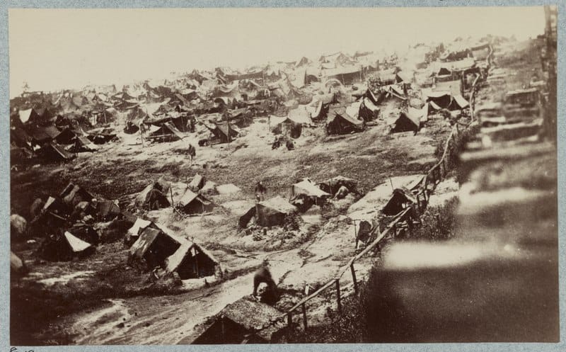 A Civil War Era photo of Camp Sumter shows the flimsy huts and awful conditions that made Andersonville so deadly.