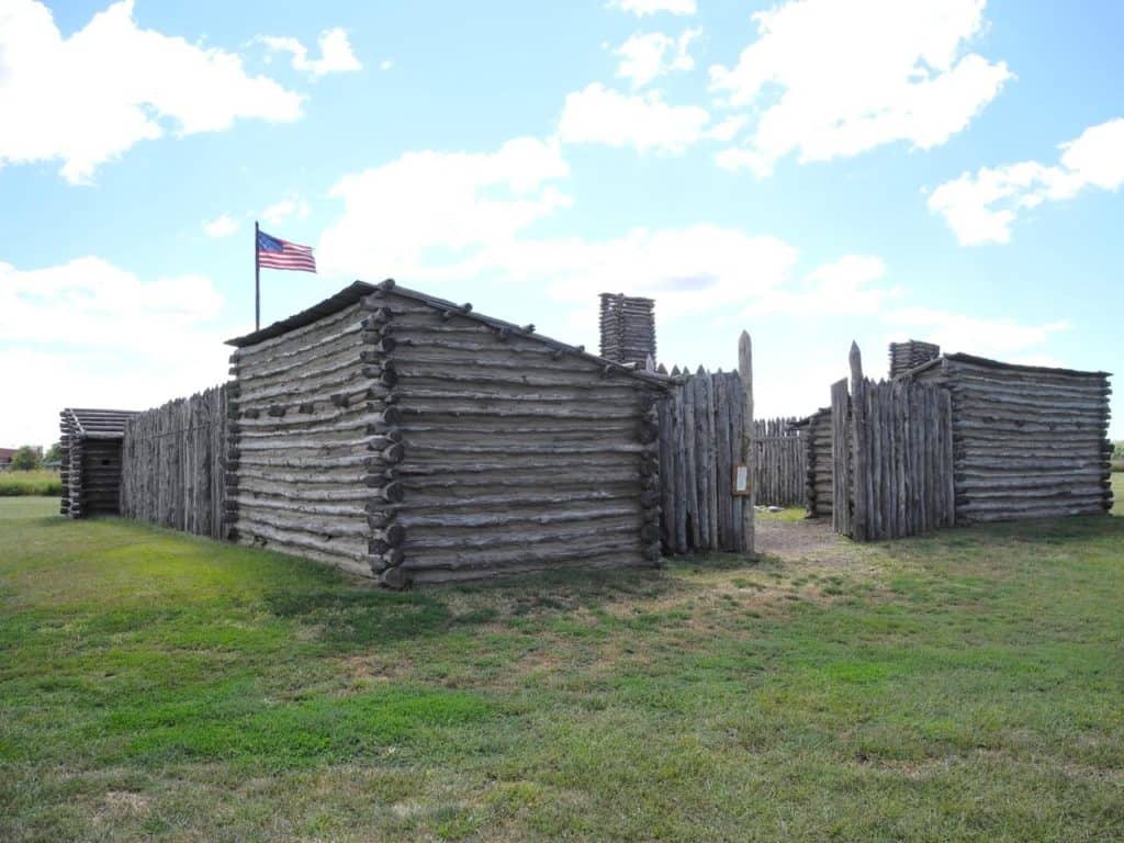 An early American flag flies over a replica of the fort at Camp Dubois. 