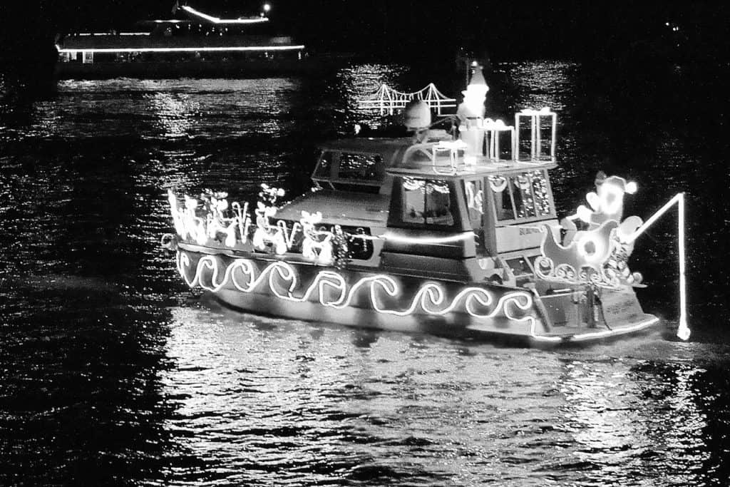 A close up shows just how many light displays can fit on a boat at the Christmas Ship Parade. This event is one of the best places to see Christmas lights in Portland.
