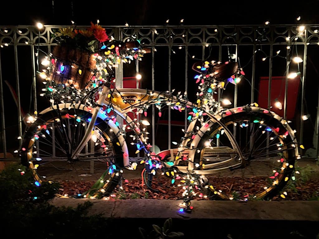 A bike is entirely wrapped with Christmas lights. There is no way to actually ride the bike because of all of bulbs and the wiring.best places to see christmas lights in portland
