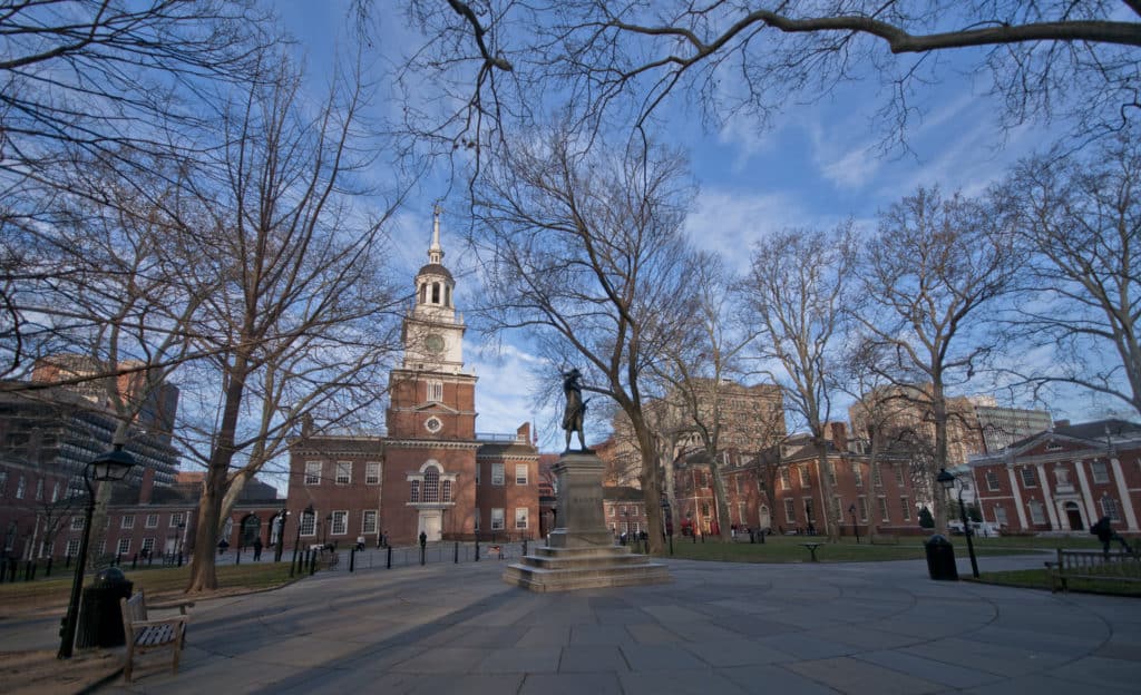Independence Hall towers over Independence National Historical Park. You can find all of the national treasures on Dinkum Tribe's list of national parks and monuments by state. Image by NPS.