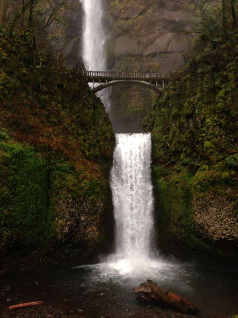 Mighty Multnomah Falls cascades among green cliffs in the Columbia River Gorge.