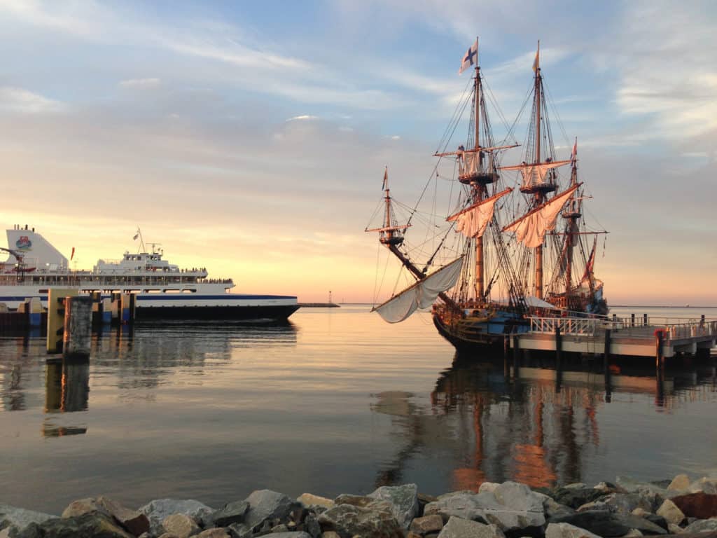 A ferry stands at the ready not far from a tall masted colonial sailing ship. Image from GPA Photo Archive. list of national parks and monuments by state