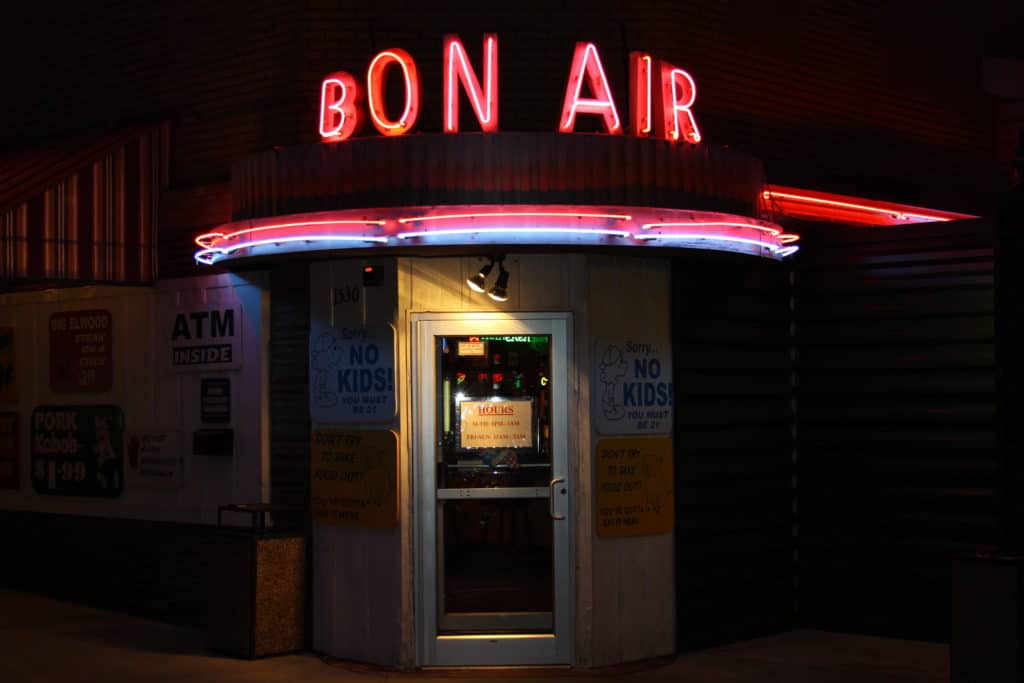 "BON AIR" lights up the night in Pink Neon at the entrance of Fast Eddie's Bon Air.