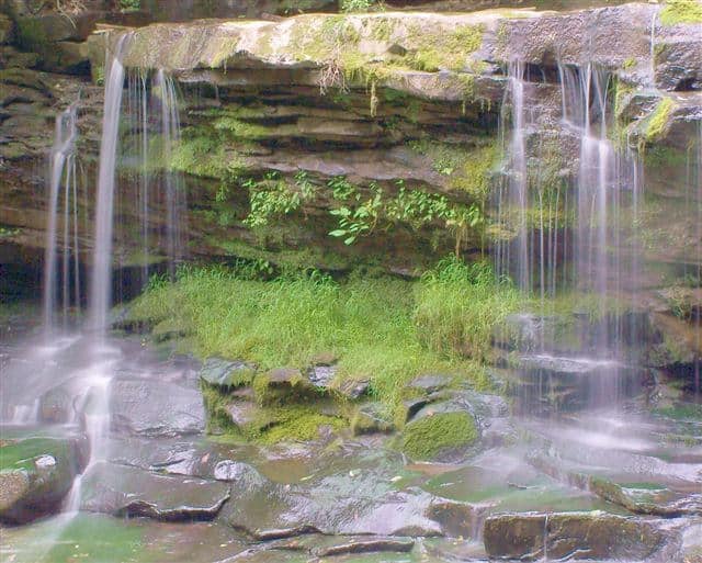 Water falls down rocky clefts at Gauley River National Recreation Area. Image from GPA Photo Archive. list of national parks and monuments by state
