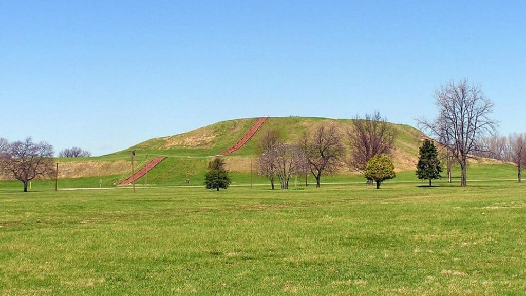 The massive Monks Mound rules over the open park area at Cahokia Mounds State Historic Site.
