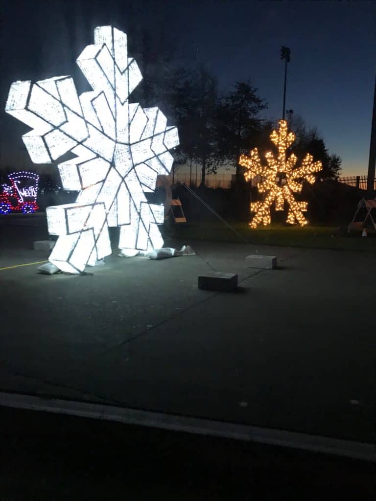 Enormous snowflakes stand at Hillsboro's Lightopia light display.
Lightopia is one of the 9 best places to see christmas lights in Portland.