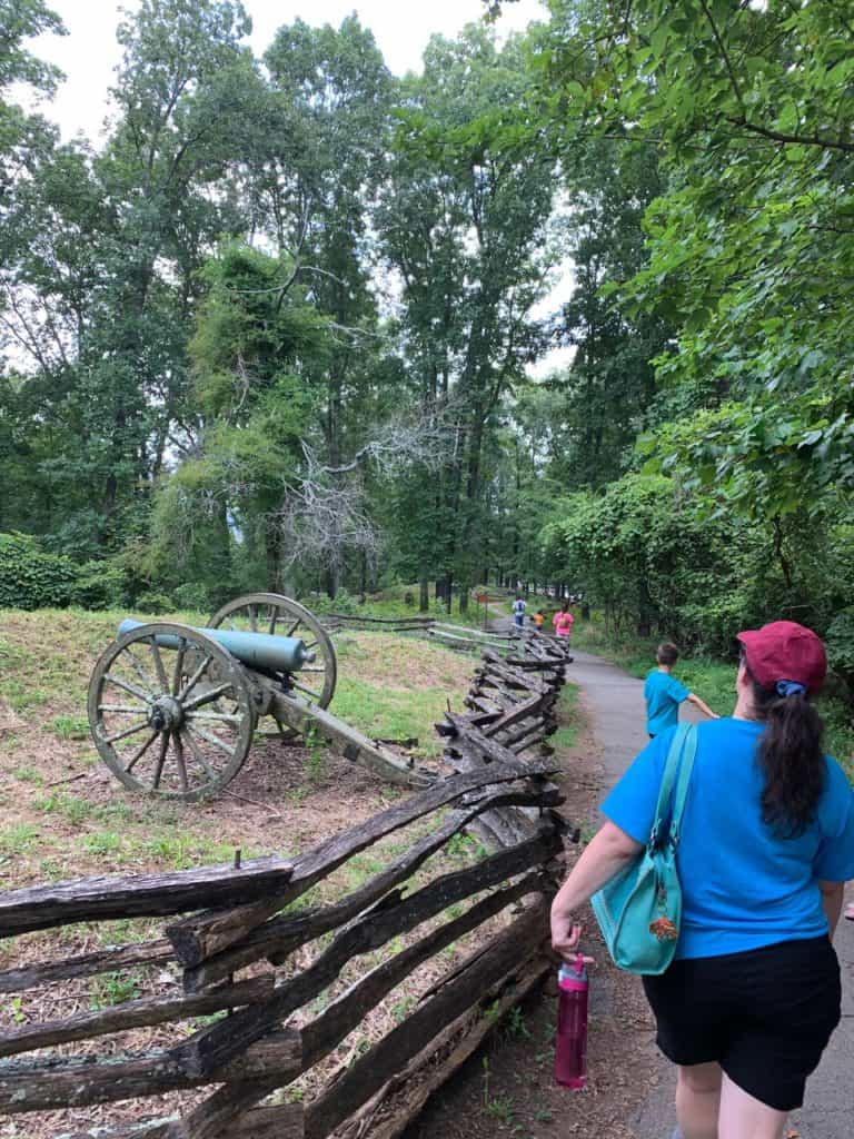 My wife and children walk along a line of Confederate canons perched on top of Kennesaw Mountain. You can find all of the national battlefield parks on Dinkum Tribe's List of National Parks and Monuments by State.