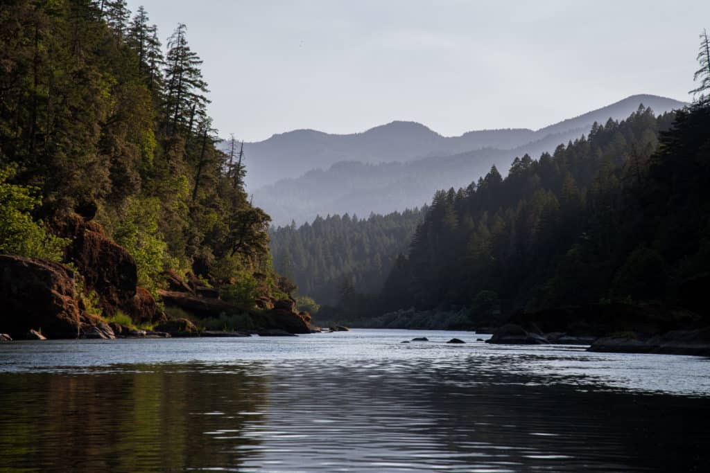 The Rogue River winds through the forested ranges of Southern Oregon.