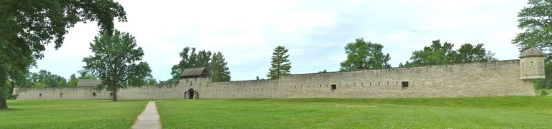 Image shows the long main gate and long exterior walls of Fort de Chartres.