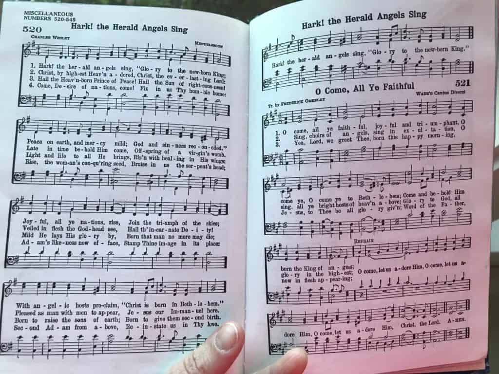 Hymnal showing Christmas carols. Family Christmas bucket list.