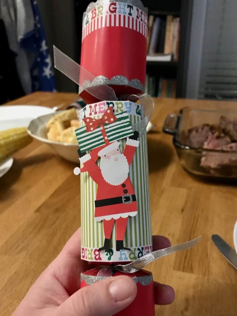 British Christmas cracker with Santa decoration. Family Christmas bucket list.