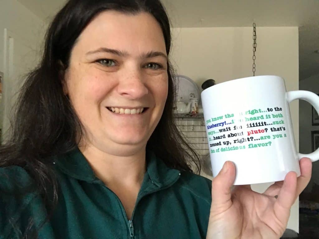 Woman holding mug with quotes from the Psych TV show. Best gifts for homeschool moms.