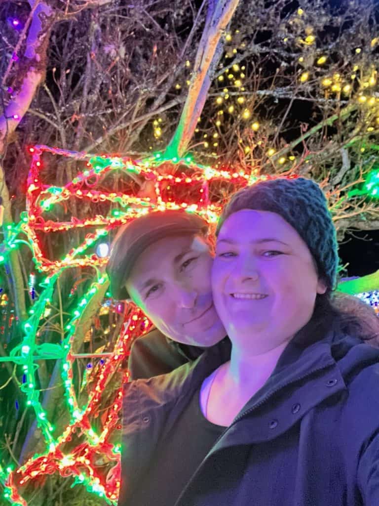 Jennifer and I smile together in a bright, holiday selfie. We hope you enjoy the very best Christmas lights in Salem Oregon.