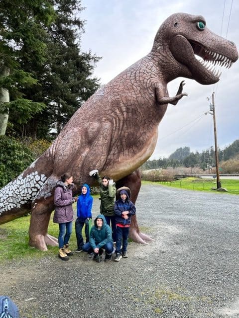 Giant T. rex with kids in front of the Prehistoric Gardens in Oregon. dinosaur gifts for a 5 year old