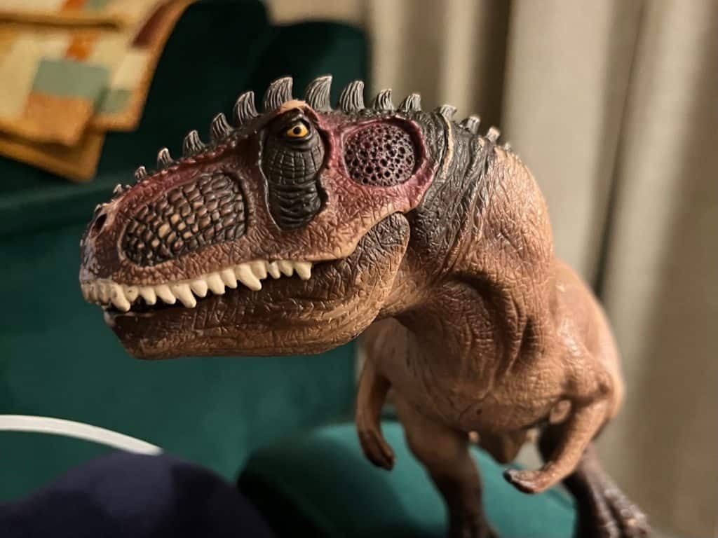 Close-up of the head of the Schleich gigonotosaurus. Dinosaur gifts for a 5 year old.