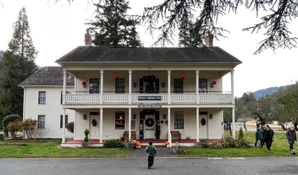 The Wolf Creek Inn & Tavern stands in holiday finery.