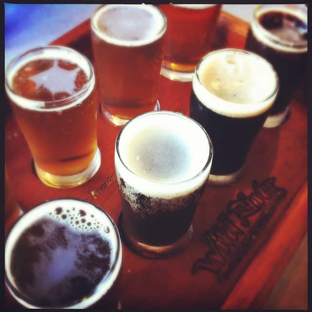 Photo shows a delicious flight of beer samples from Wild River Brewing.