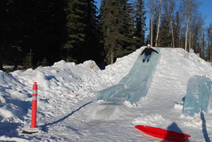 Ice slide in Alaska. Winter activities for teens.