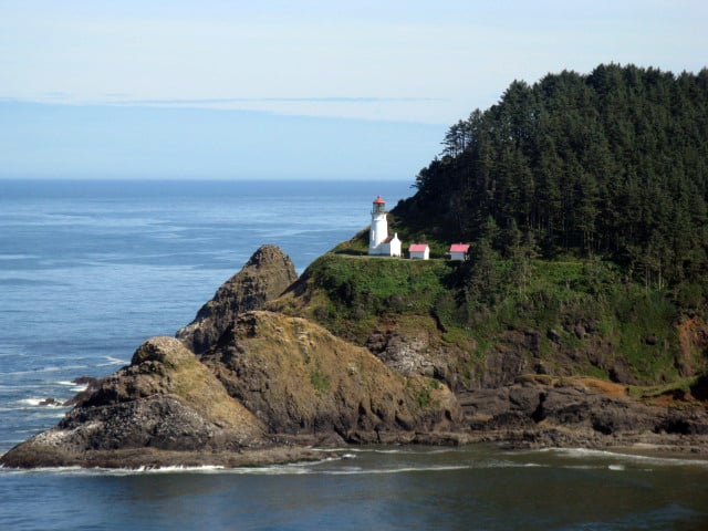 Haceta Head Lighthouse stands beautifully at Haceta Head State Scenic Viewpoint, one of the most beautiful places to visit when touring the Oregon Coast with kids.