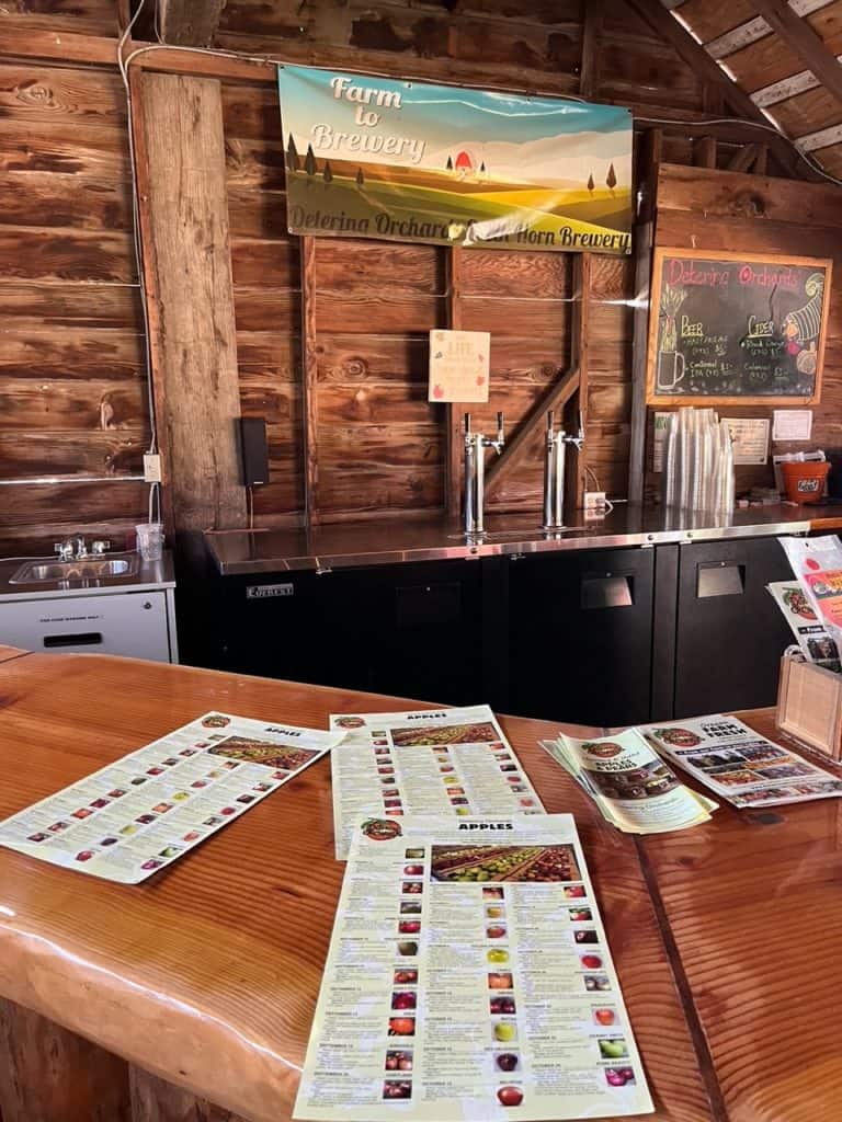 Drink menus sit on the top of Detering Orchard's handsome cider bar.