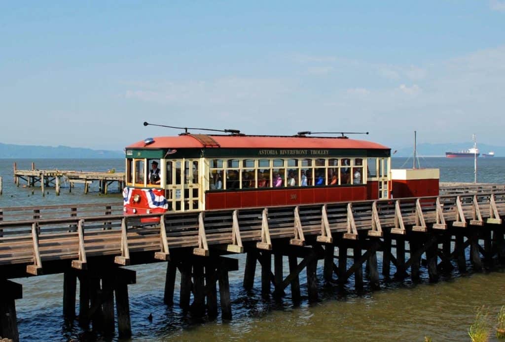 The Astoria trolley runs along the pier side railway. Astoria 