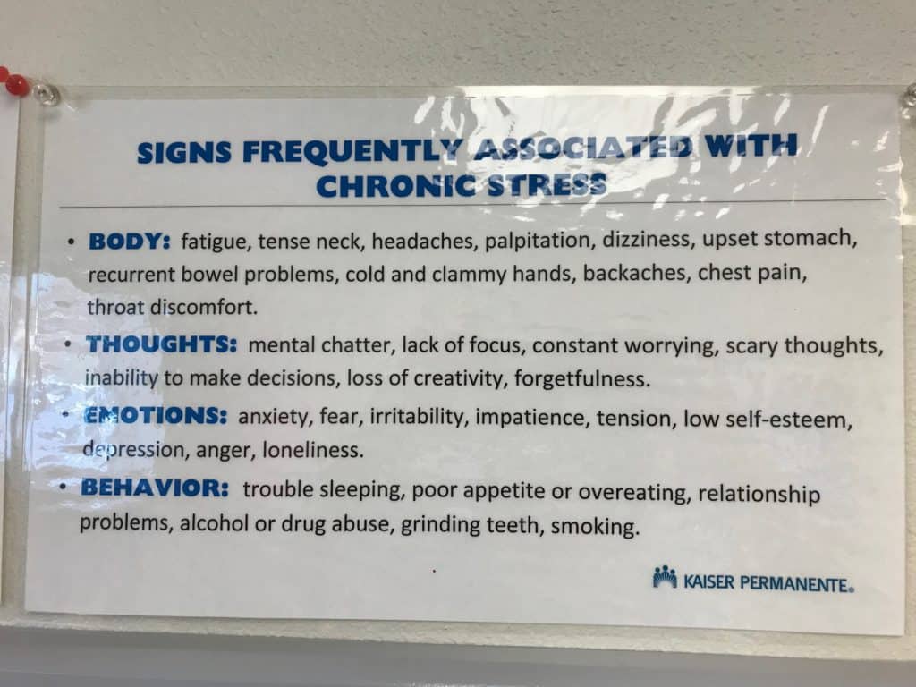 Kaiser Permanente sign discussing signs associated with chronic stress. Can anxiety cause TMJ?