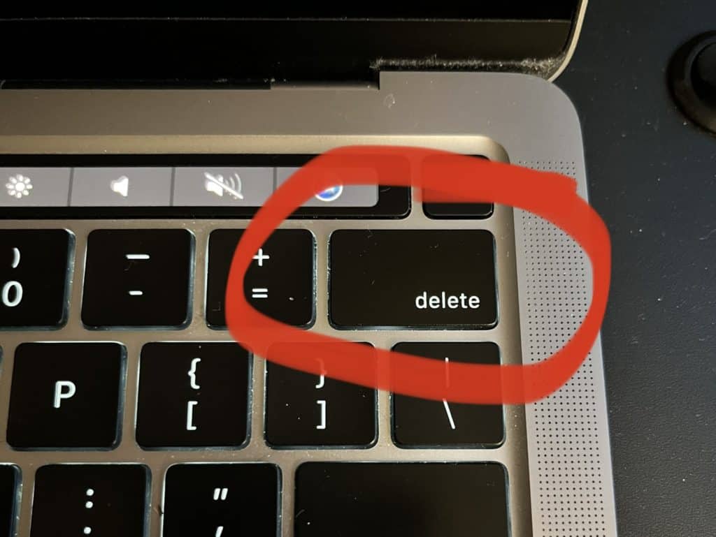 Delete key on laptop. 