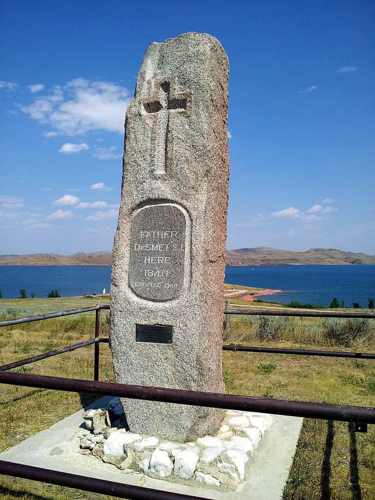A granite monument standing before Lake De Smet read "Father DeSmet here 1840."