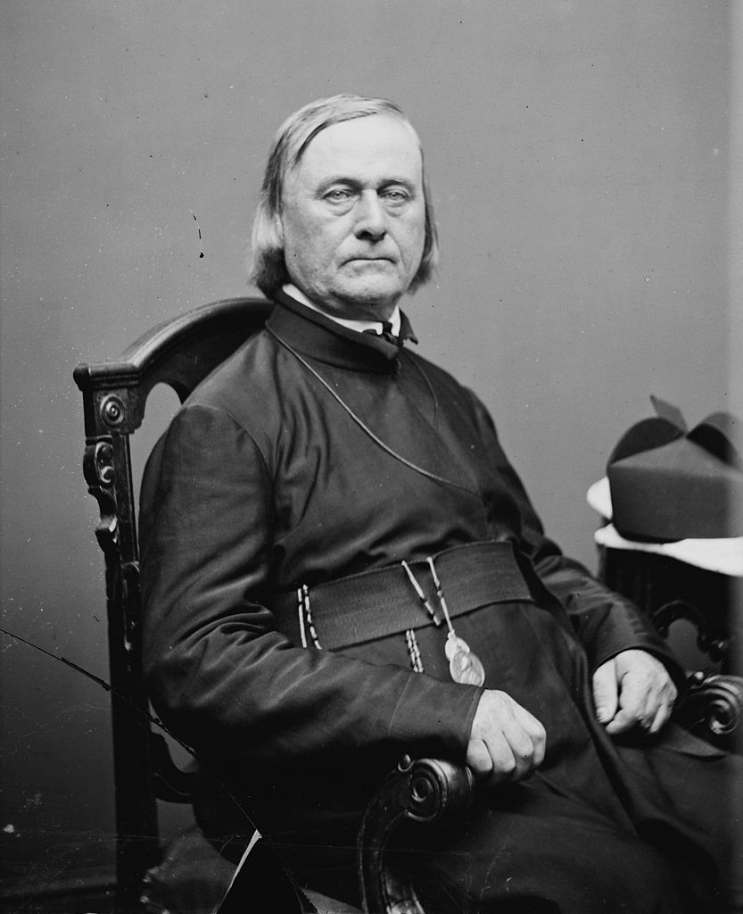 Belgian Jesuit Pierre De Smet sits in a black and white photograph.