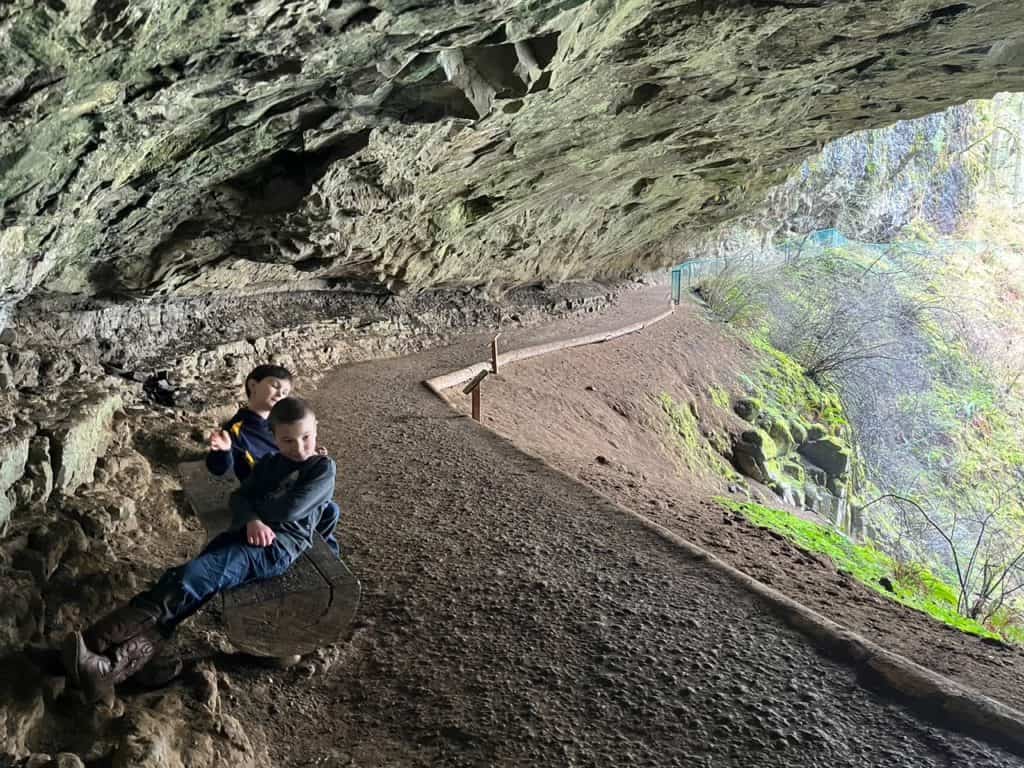 Image shows a path next to a sheer drop into the canyon. 