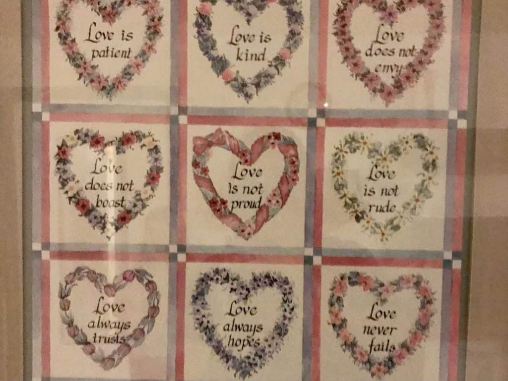 Love hearts with phrases from 1 Corinthians 13. Protecting kids from toxic family.