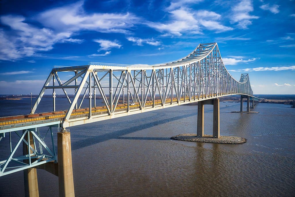 The Commodore Barry Bridge rises high above the water with two high cantilevers.