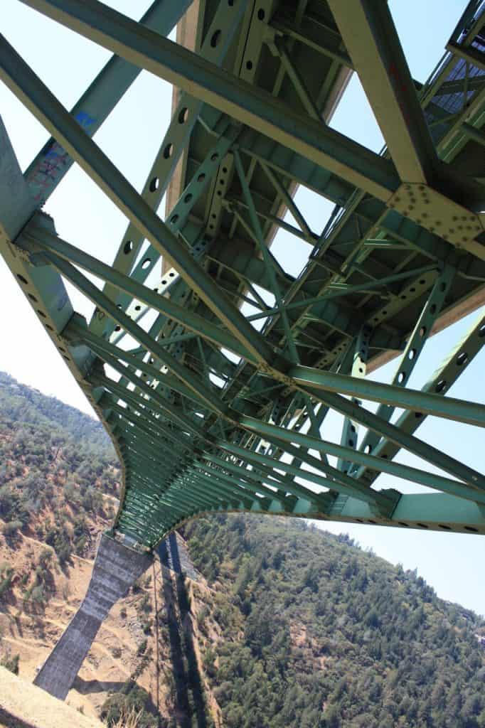 Foresthill Bridge towers over the American River in Auburn, California. Foresthill Bridge is one of the highest bridges in the US.