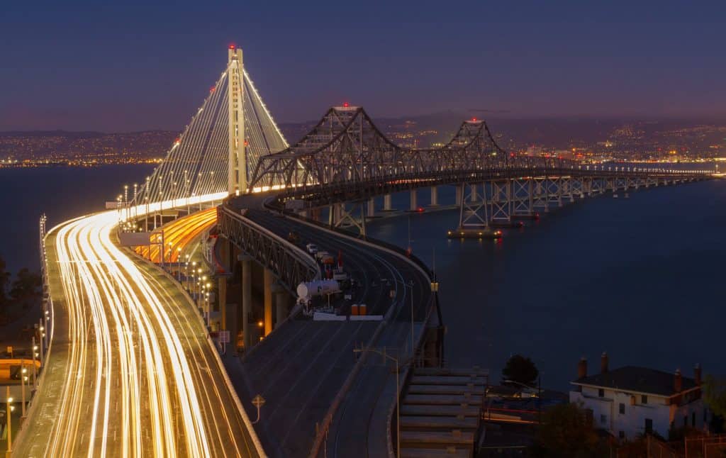 Traffic streams across the San Francisco-Oakland Bay Bridge in a time-lapse photo. The San Francisco-Oakland Bay Bridge is one of the highest bridges in the US.