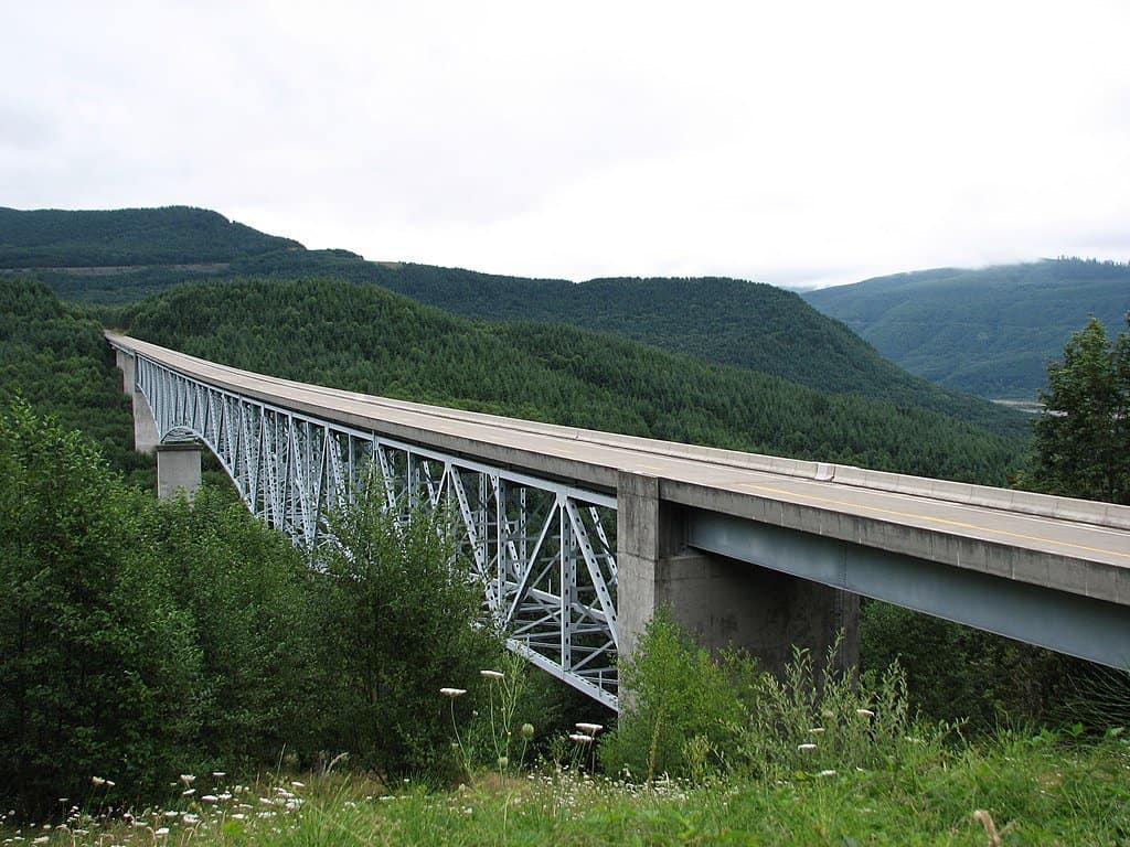 Hoffstadt Creek Bridge welcomes people into the forestland surrounding Mount St. Helens National Volcanic Monument. 
