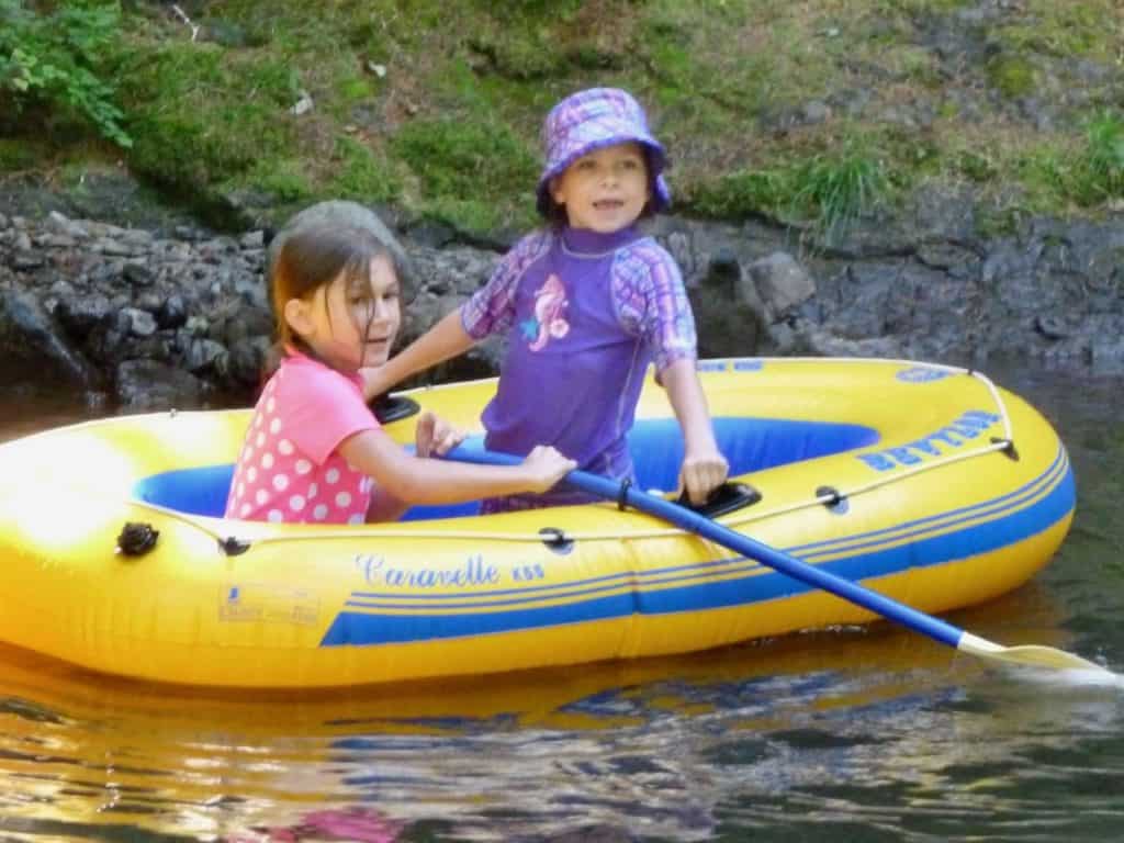 Girls in inflatable raft.
