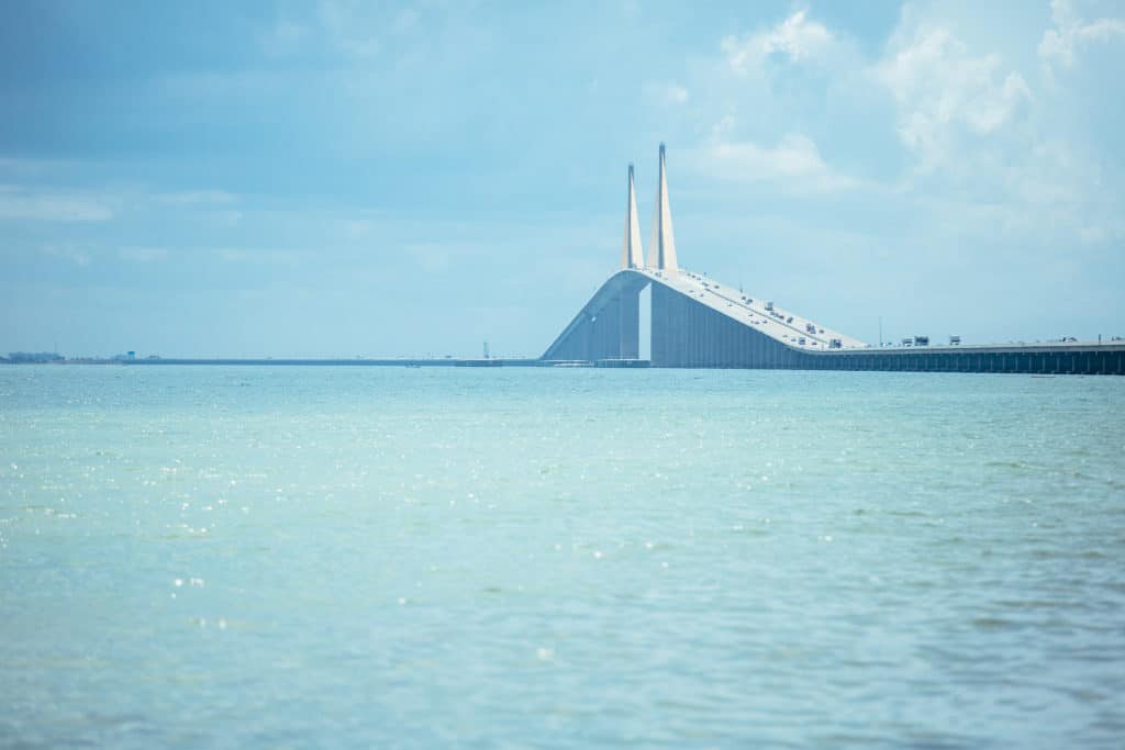 Vehicles move up and down the enormous Sunshine Skyway Bridge.