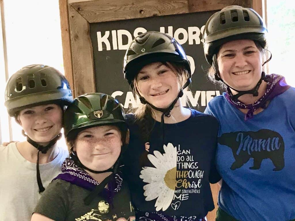 Mom and 3 girls at horse camp.