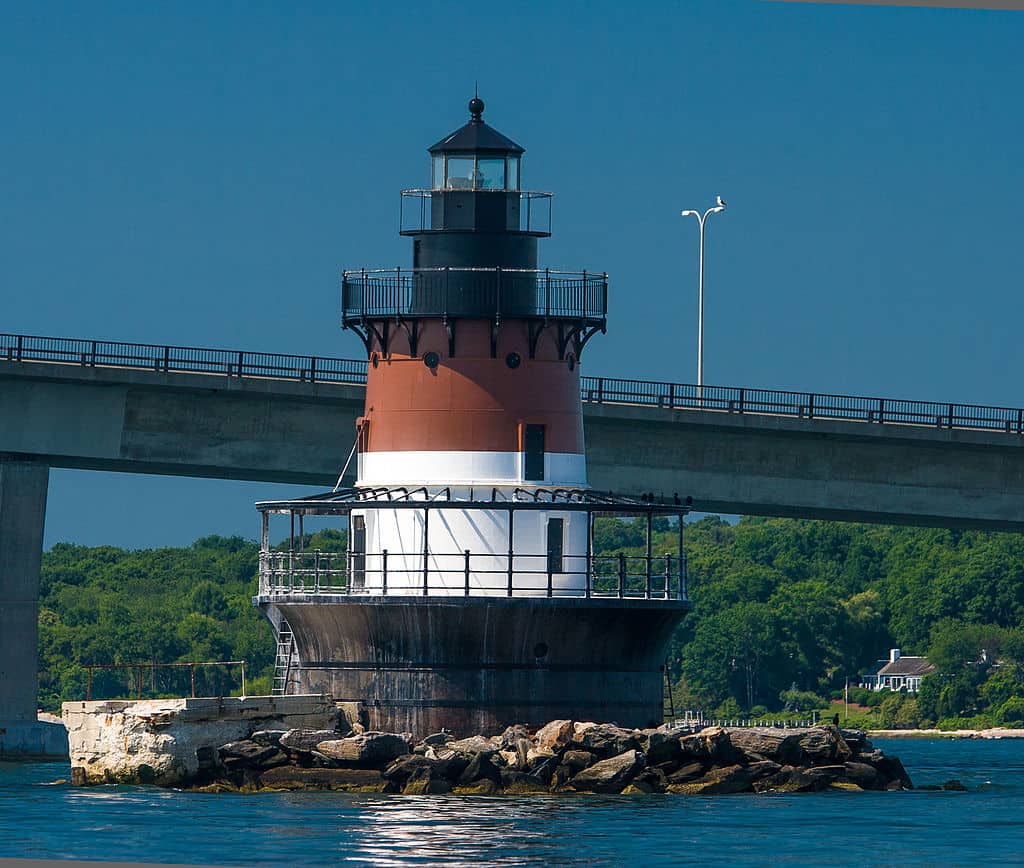 A lighthouse stands right beside the Jamestown Verrazzano Bridge.