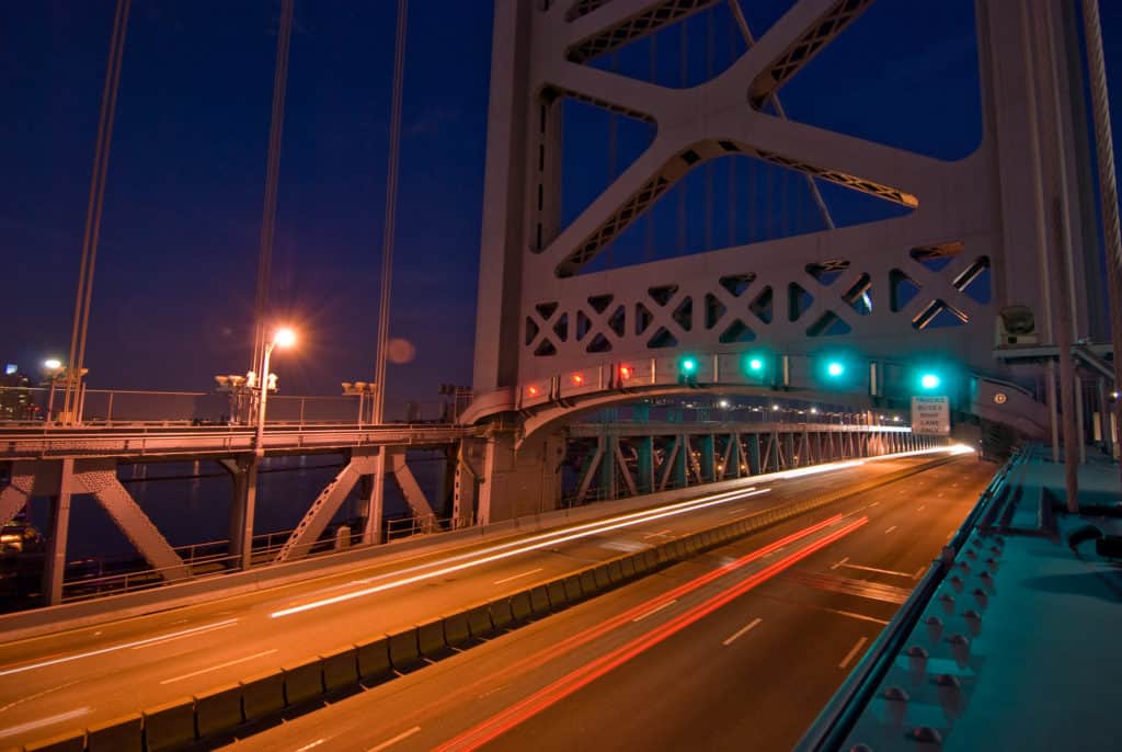 Cars rush along the Benjamin Franklin Bridge in a time-lapse photo. The Benjamin Franklin Bridge is one of the highest bridges in the US.