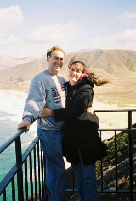 My wife and I smile at the Point Sur Lighthouse not far from Bixby Creek Bridge.