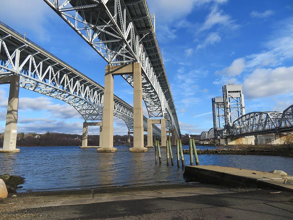 The picture shows both spans of the Gold Star Memorial Bridge and a nearby railroad bridge.