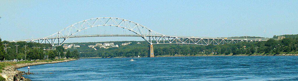The Bourne Bridge stands tall in Bourne, Massachusetts. The Bourne Bridge is one of the highest bridges in the US.