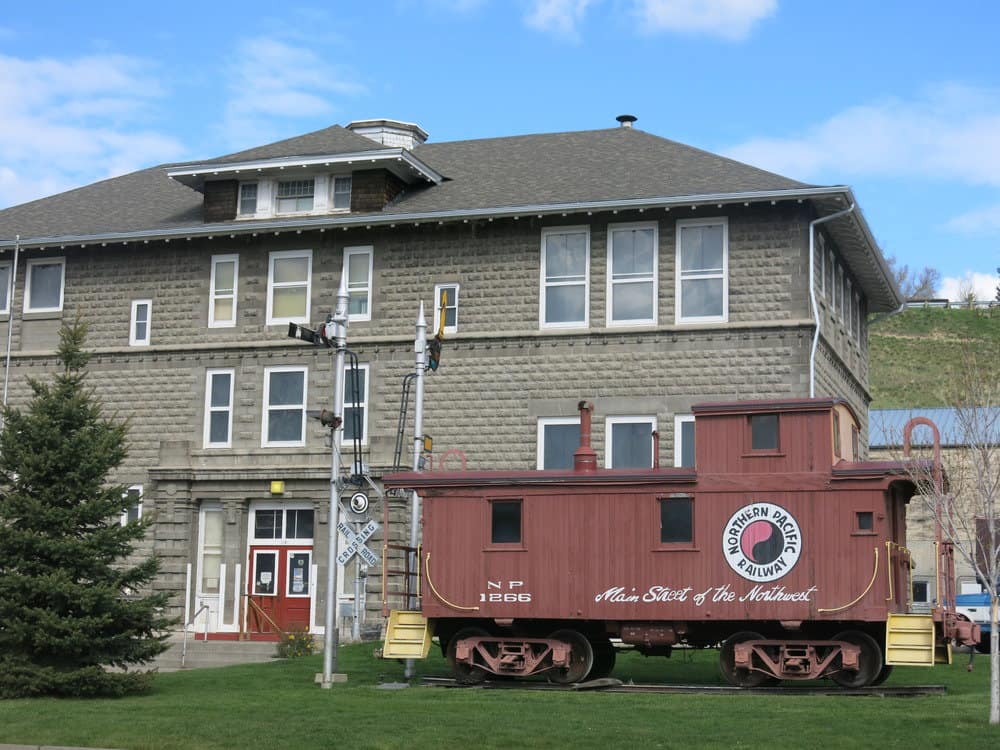 Image shows Yellowstone Gateway Museum and their Northern Pacific Railway Caboose. Yellowstone Gateway is one of the 21 best museums in Bozeman and the Bozeman area.