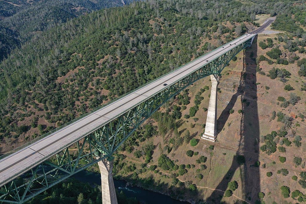An aerial photo of the Foresthill Bridge in California. Foresthill Bridge is one of the highest bridges in the US.