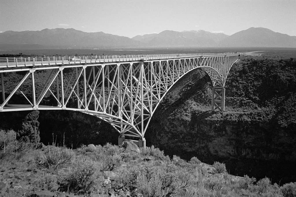 The Rio Grande Bridge provides crossing over the enormous Rio Grande Gorge in New Mexico. Rio Grande Bridge is one of the 89 highest bridges in the US.